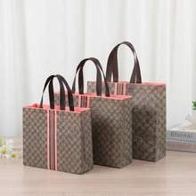 Load image into Gallery viewer, Luxury Grid Pink Stripes Non-woven Gift Bag